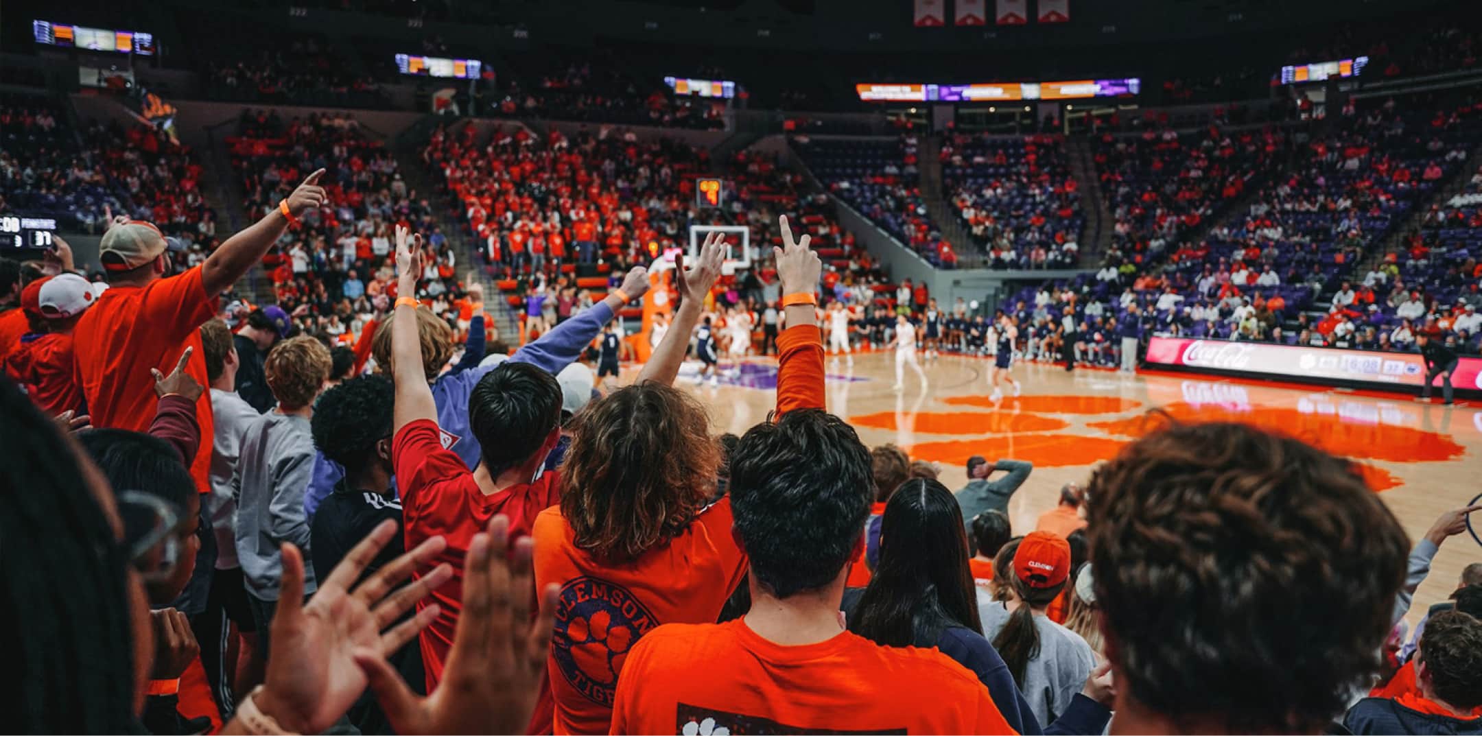 Crowd cheering at a Clemson basketball game