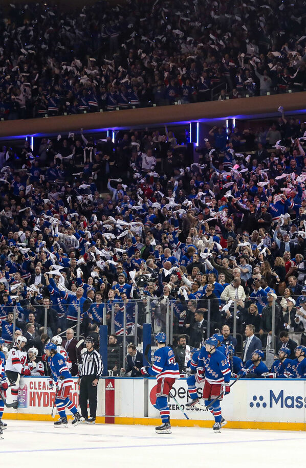 Players and Fans at a NHL Hockey Game