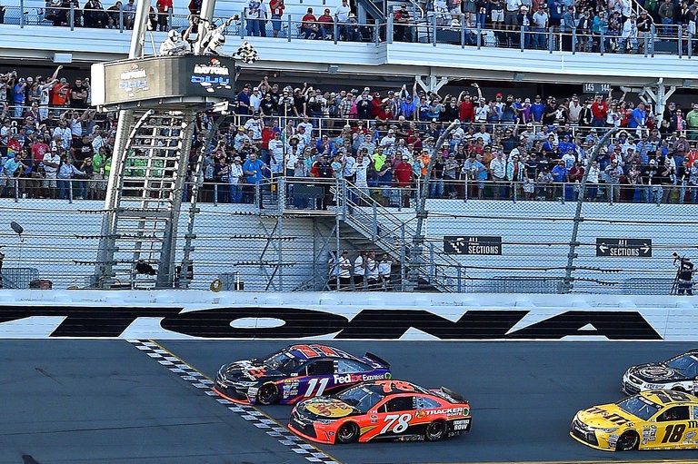 Denny Hamlin beats Martin Truex to the line in the 2016 Daytona 500. Photo via The New York Times