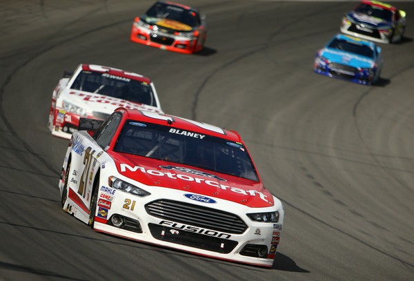 RCR's Ryan Newman chases down Wood Brothers driver Ryan Blaney. Photo via zimbio.com