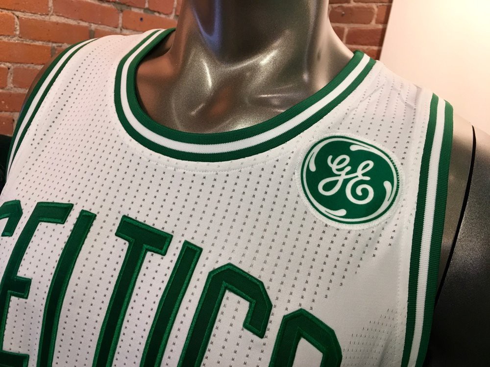 Due to the color scheme and design, the GE logo is seamlessly integrated onto the Celtics jersey. Photo via Kyle Clauss - Boston Magazine
