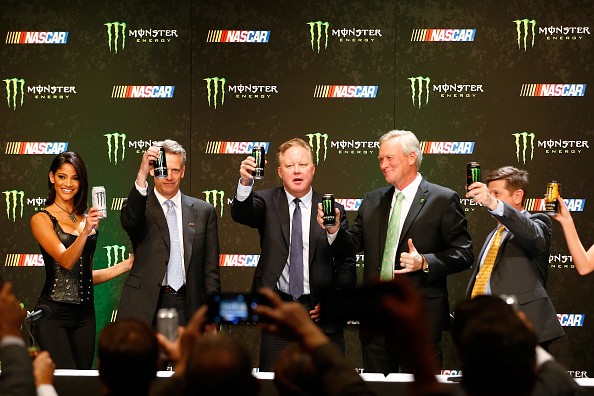 NASCAR CEO Brian France and Monster Energy Chief Marketing Officer Mark Hall finalize the sport's newest deal. (Photo via gettyimages.com)