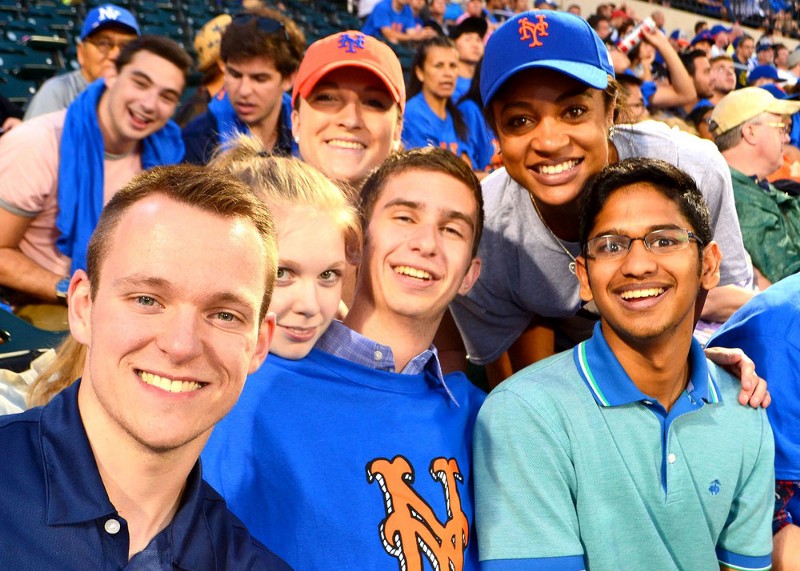 Sanjit (far right) and his other MSBA members enjoy a Mets game last summer. Photo via Bailey Weigel