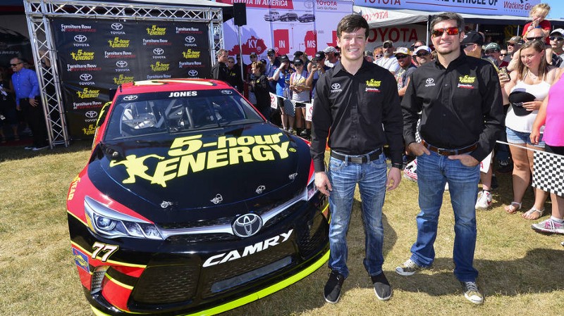 Jones at the unveiling of his No. 77 Furniture Row Racing Camry. Photo from Autoweek.