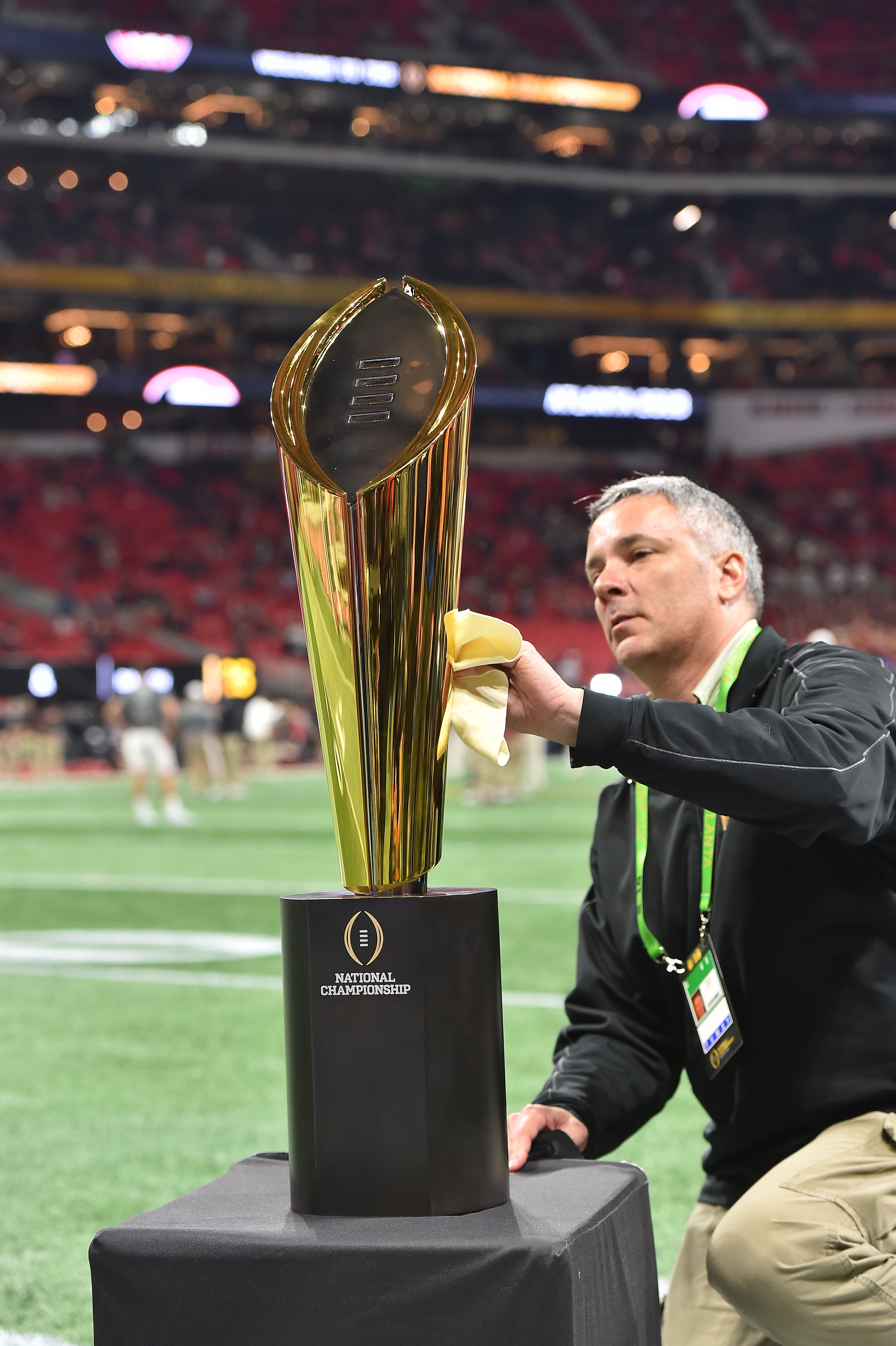 College Football Playoff trophy available for pictures with fans