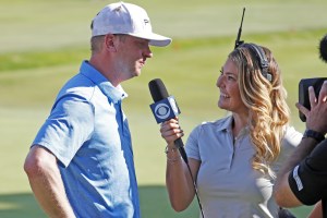 Jun 30, 2019; Detroit, MI, USA; Nate Lashley talks wit with CBS reporter Amanda Balionis on the 18th green after winning the Rocket Mortgage Classic golf tournament at Detroit Golf Club. Mandatory Credit: