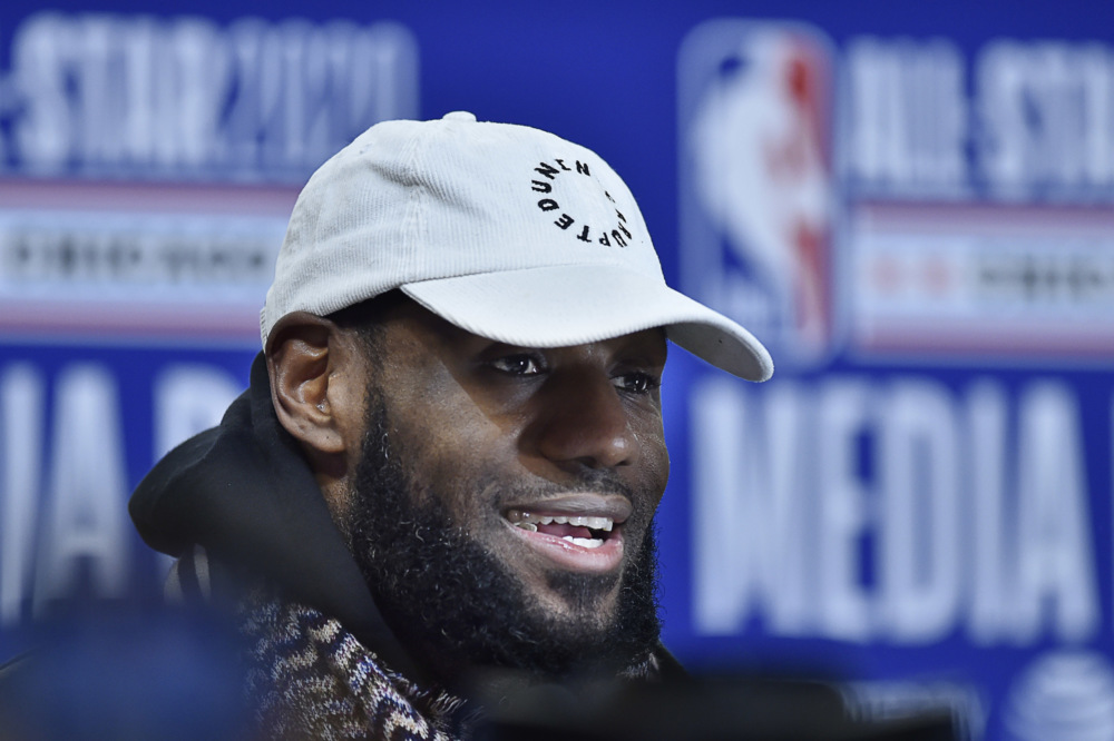 In Photos: LeBron James repeats $11000 Louis Vuitton accessory as he makes  home debut in year 21