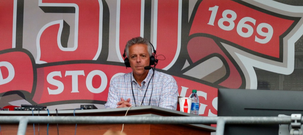Reds broadcaster Thom Brennaman in the booth.