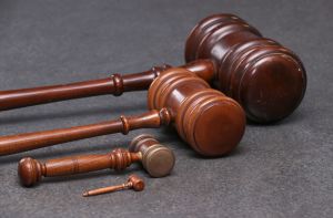 An array of gavels are pictured.