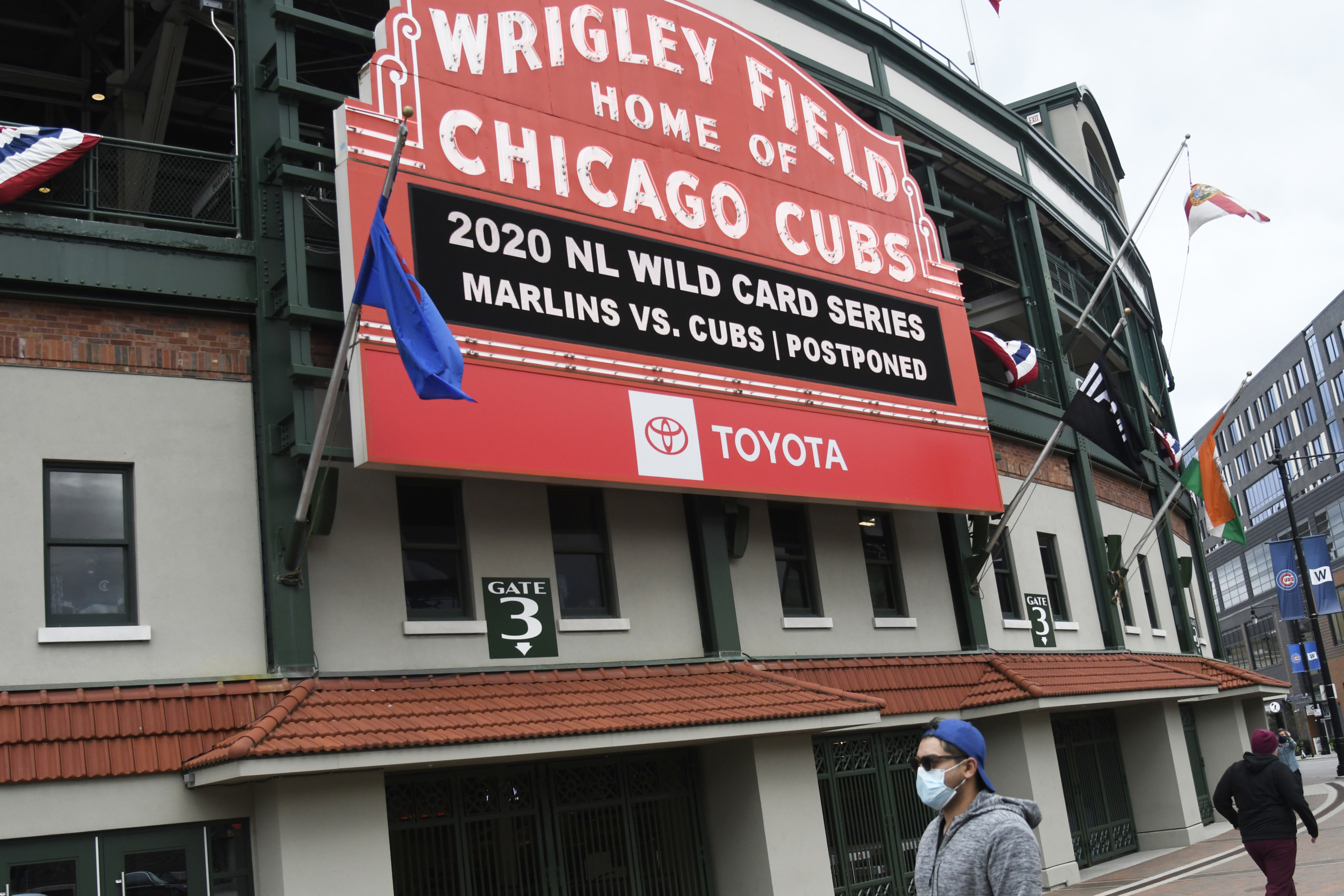 Oct 1, 2020; Chicago, Illinois, USA; A general view outside of Wrigley Field announcing the game between the Chicago Cubs and the Miami Marlins was cancelled. Mandatory Credit: