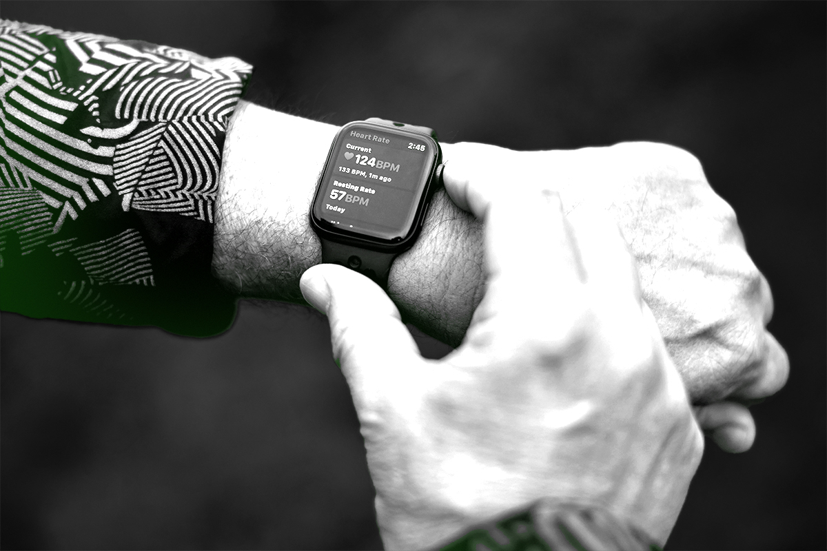 person_touching_apple_watch