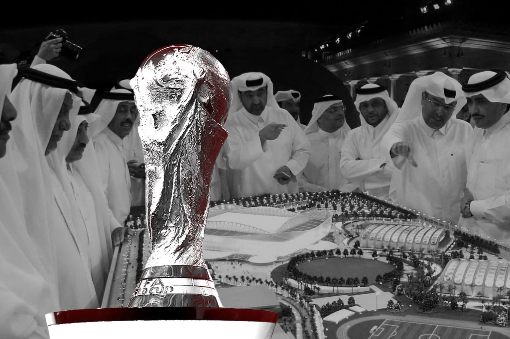 world_cup_trophy_in_front_of_men