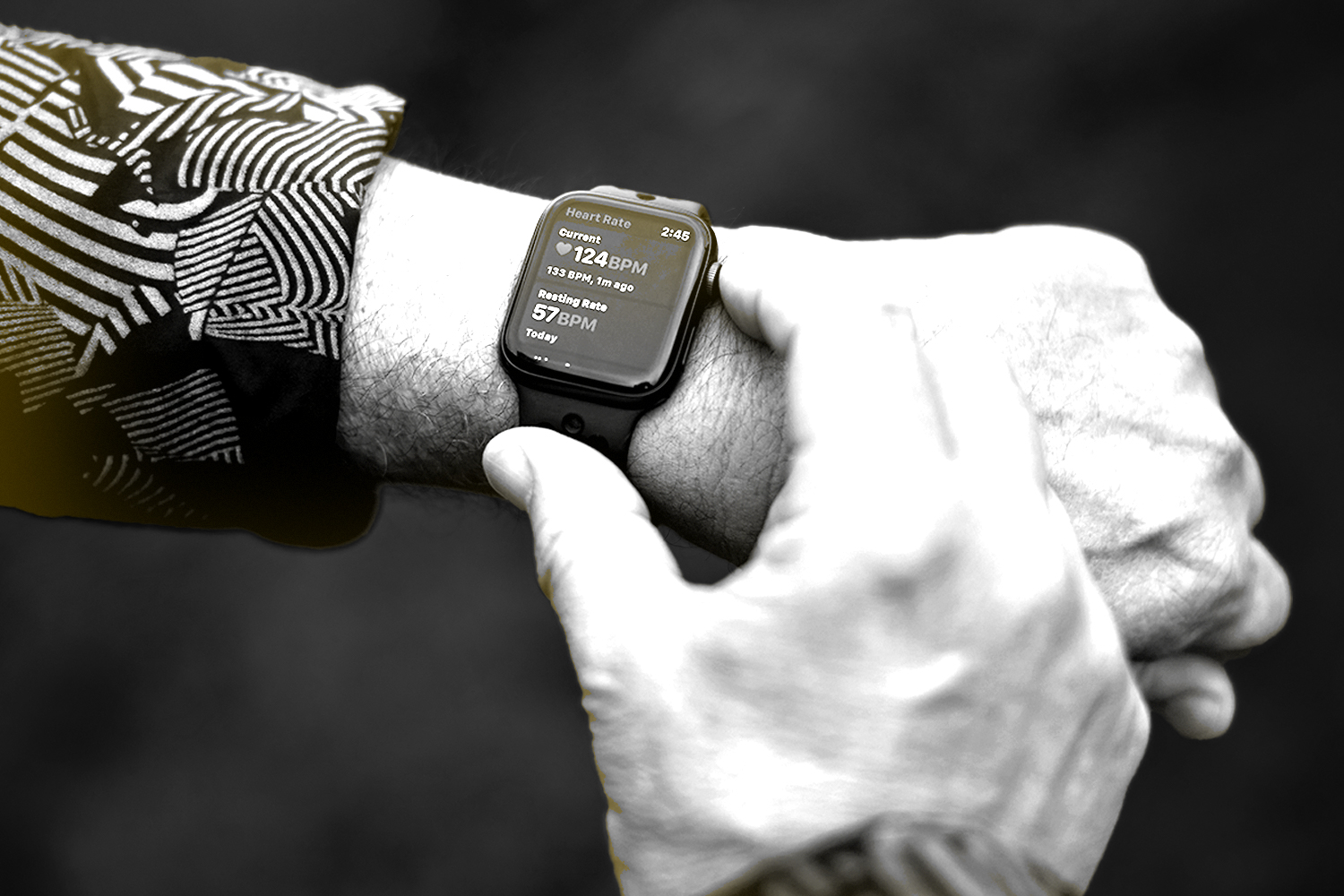 person_touching_apple_watch