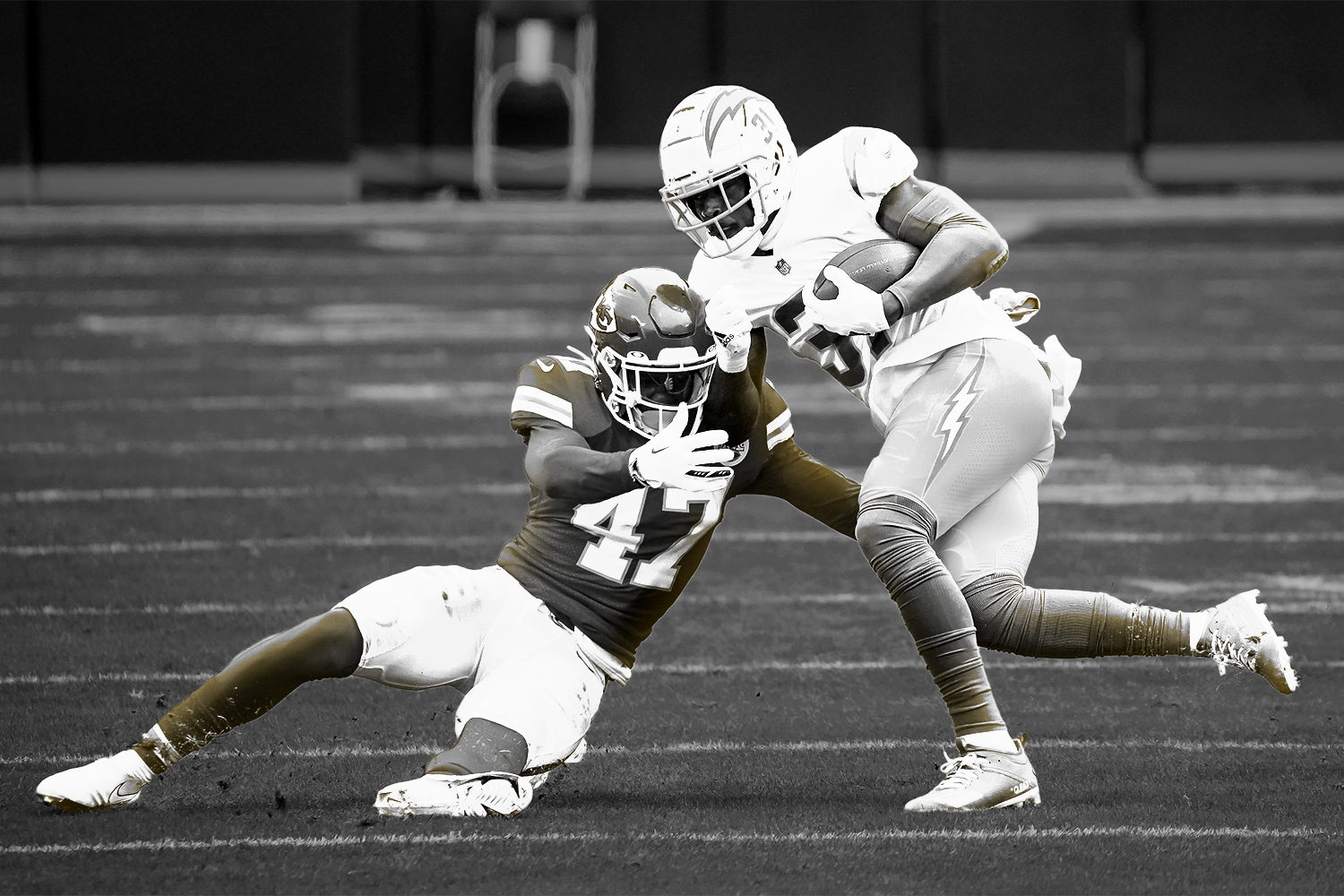 football_player_tackling_another_player