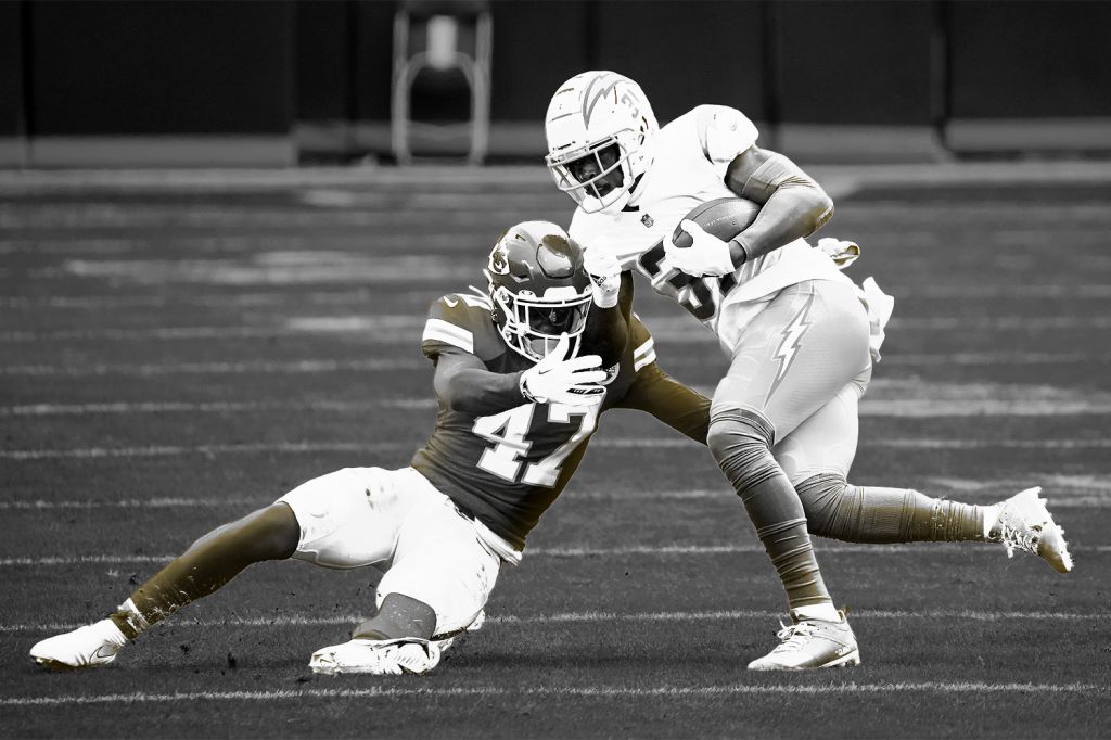 football_player_tackling_another_player