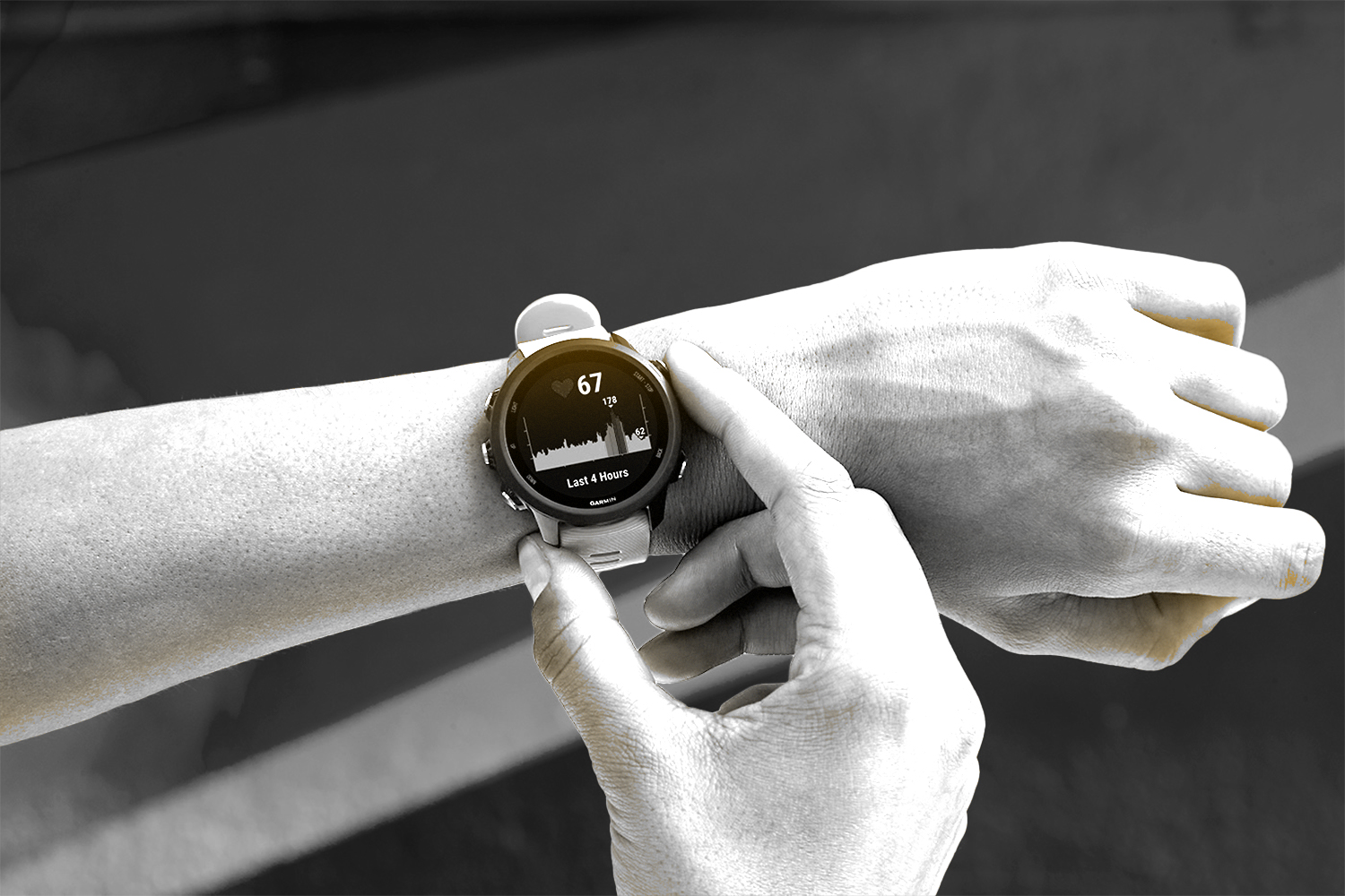person_touching_smart_watch