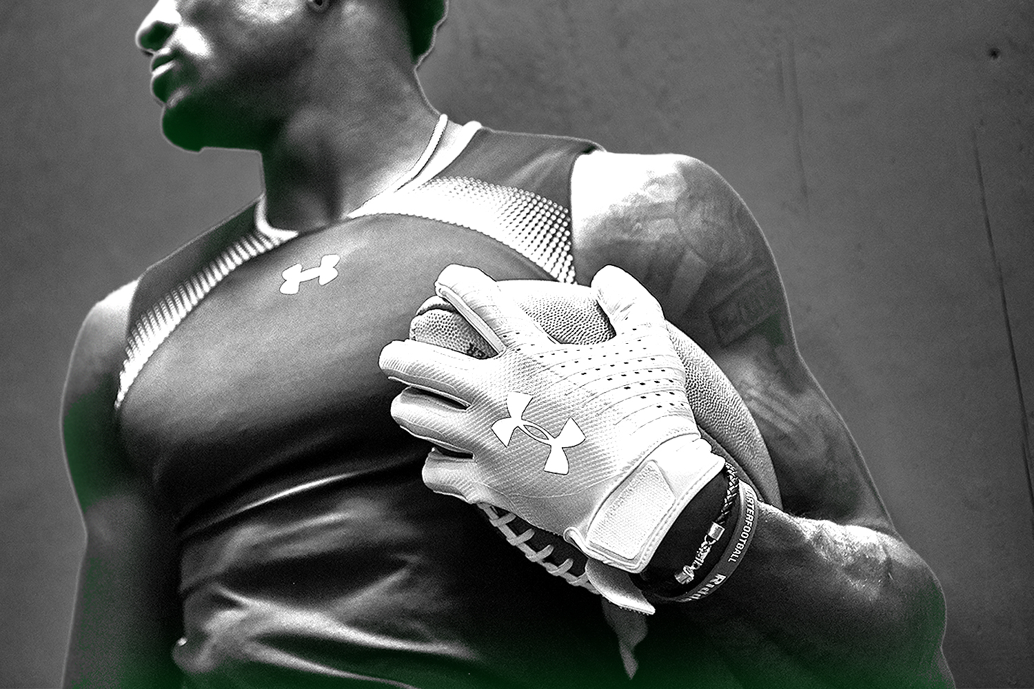 man_holding_football