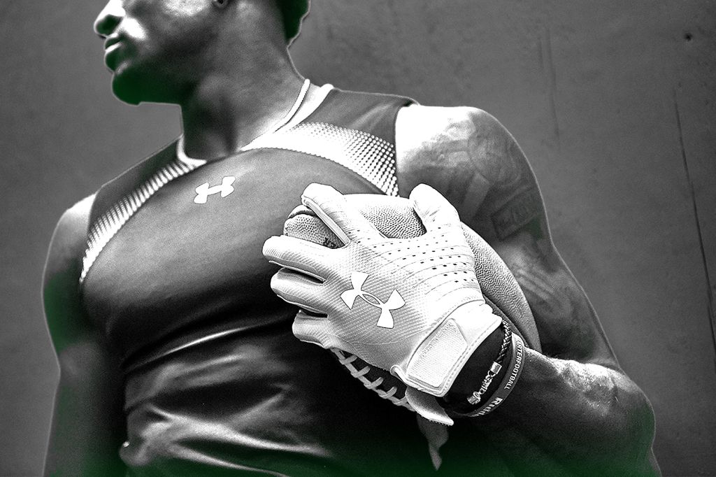 man_holding_football