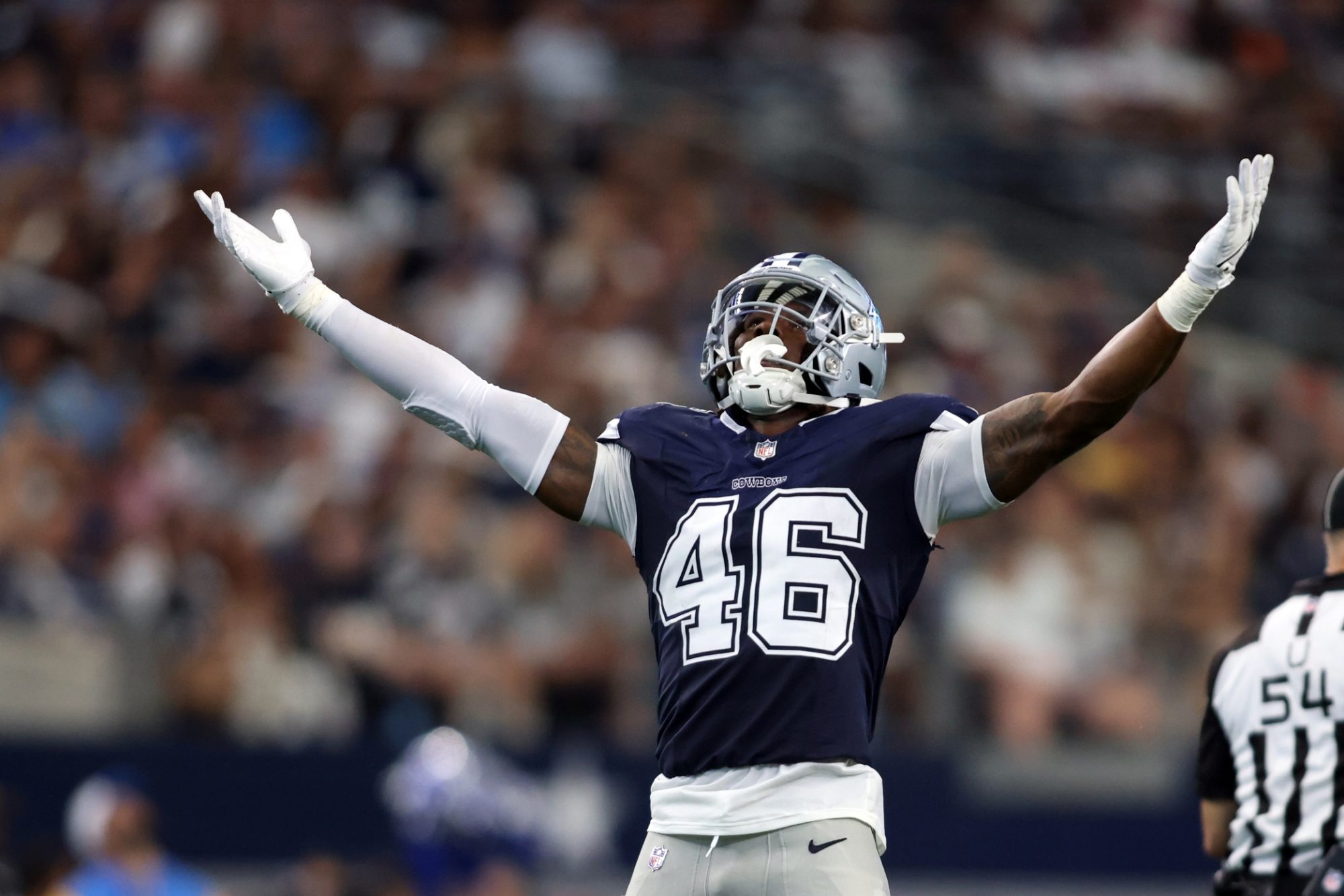 Aug 24, 2024; Arlington, Texas, USA; Dallas Cowboys linebacker Darius Harris (46) reacts after making a tackle against the Los Angeles Chargers in the second half at AT&T Stadium