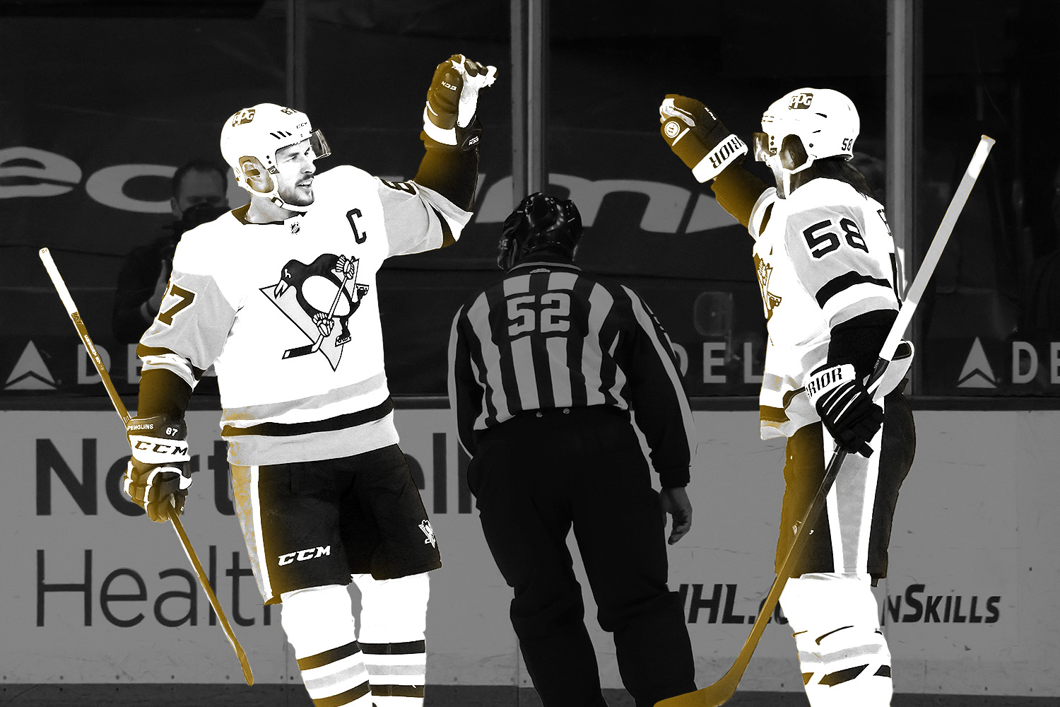 Pittsburgh Penguins' Mario Lemieux skates around the ice holding