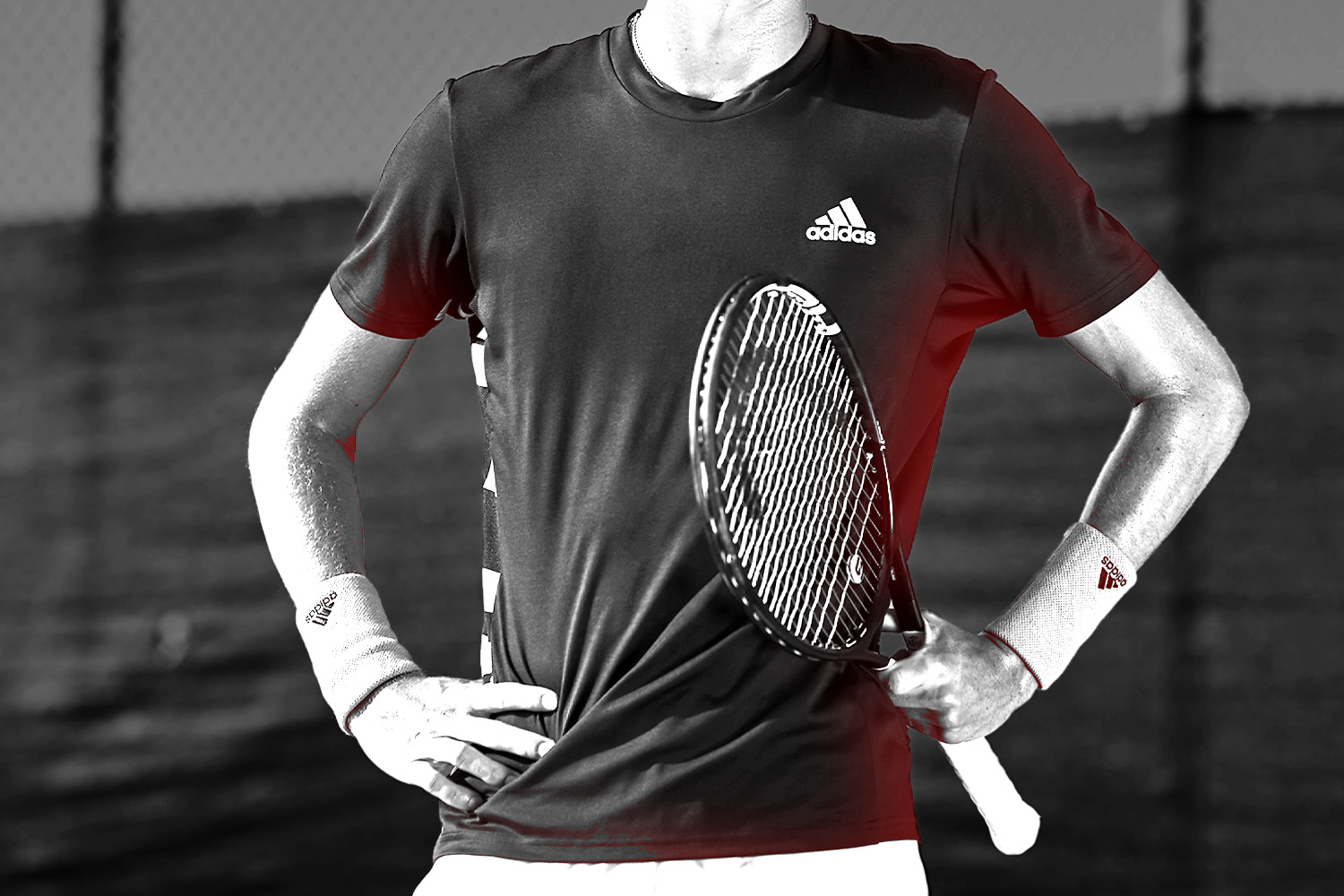person_with_adidas_shirt_holding_tennis_racquet