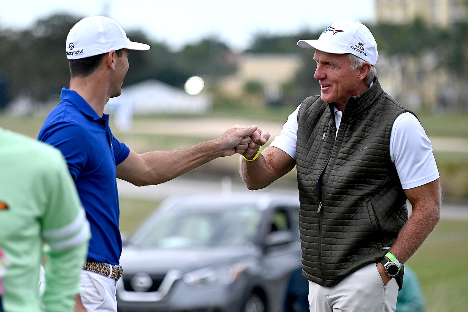 Greg Norman and players line up on the stage during the LIV Golf