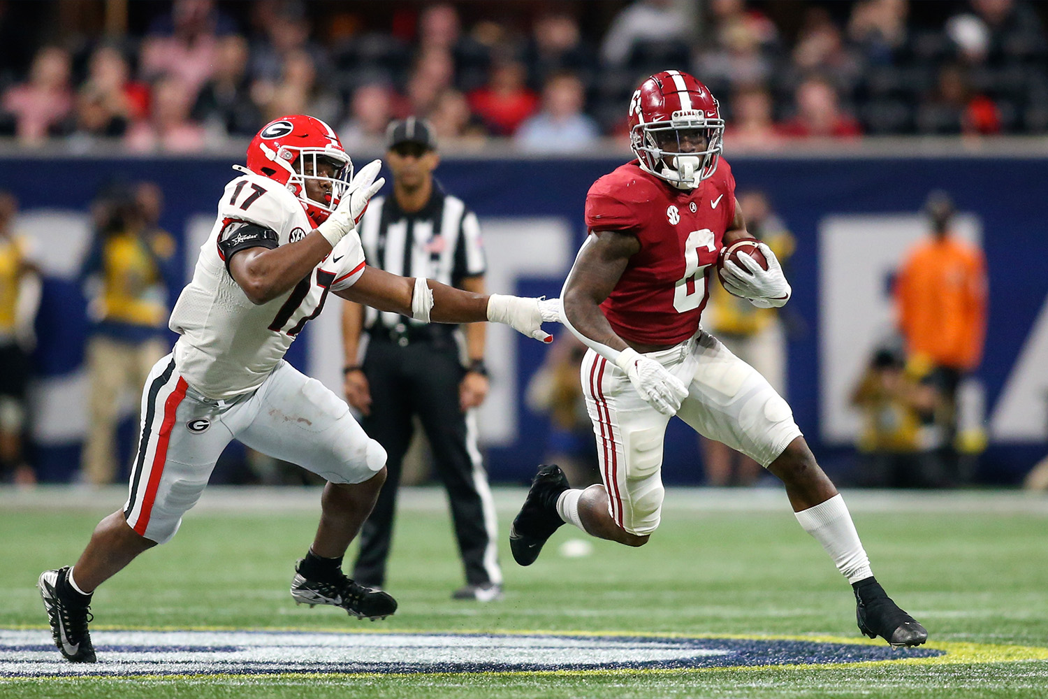 Alabama-receiver-running-past-Georgia-defender
