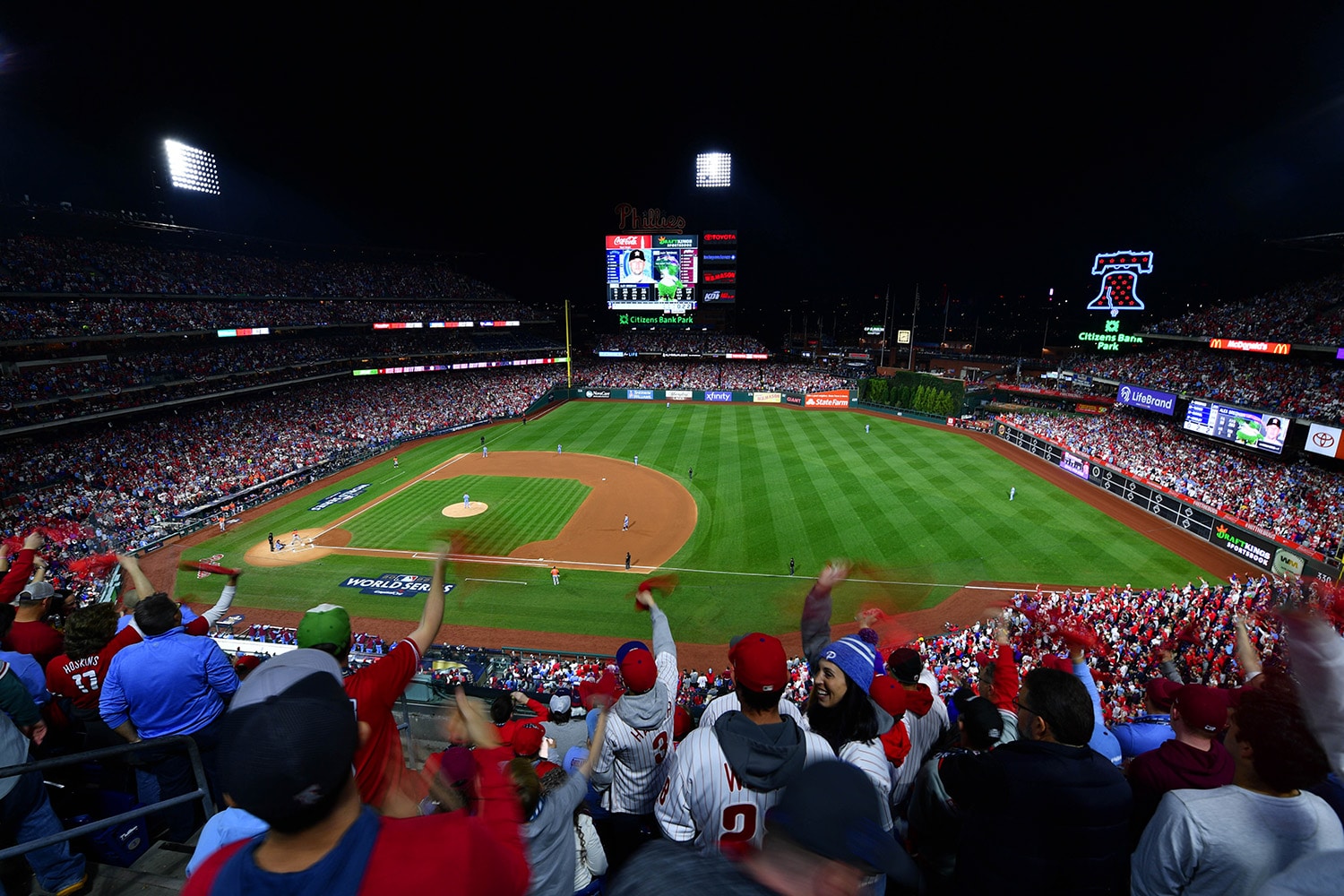 Fans cheer on the Philadelphia Phillies during a World Series game against the Houston Astros