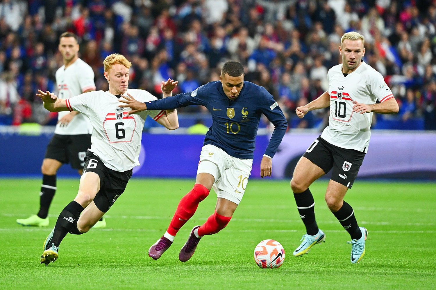 Kylian Mbappe completes dribble during France match against Austria during Nations League match