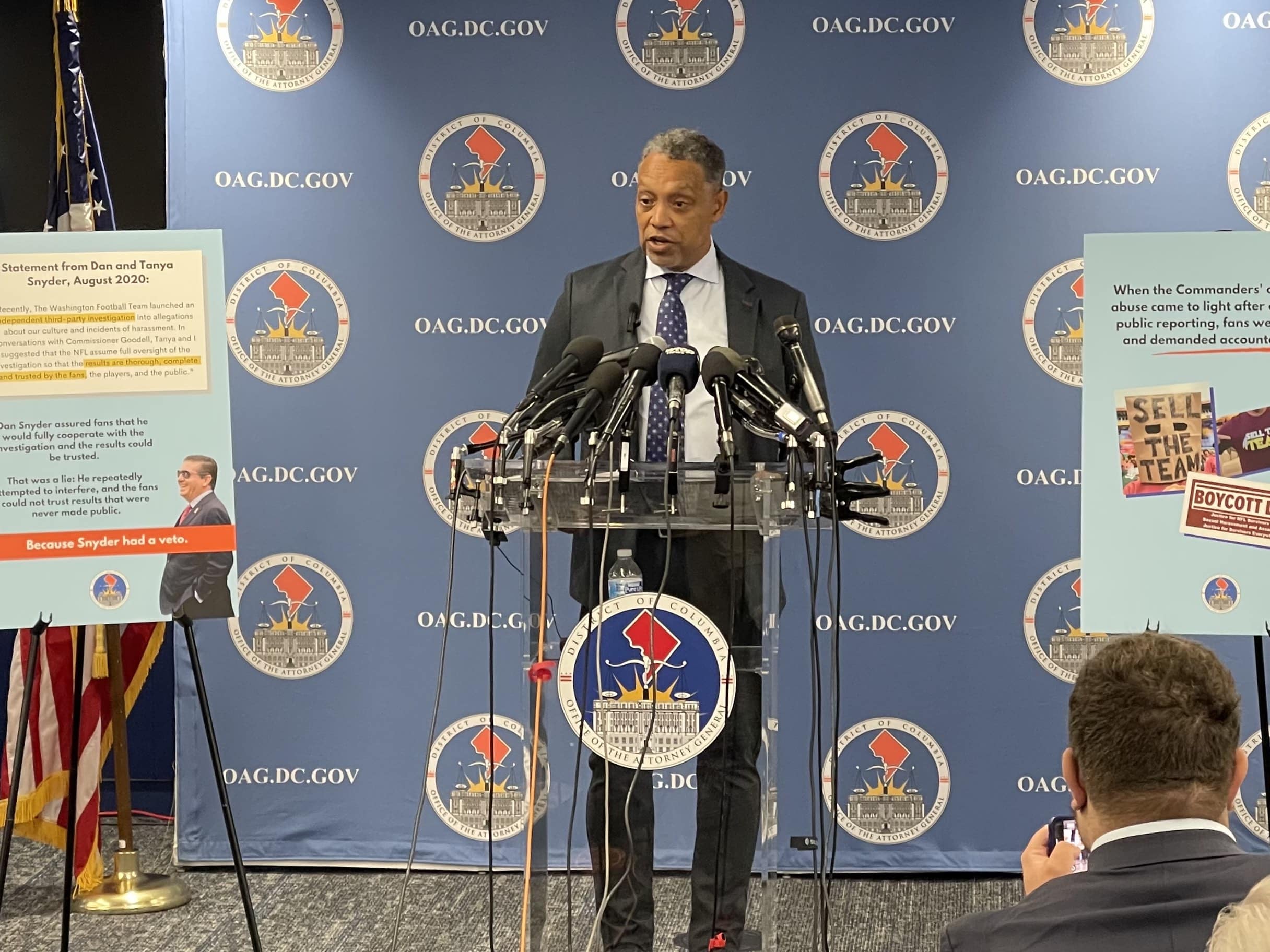 Washington, D.C. Attorney General Karl Racine speaks to media after filing law suit against Washington Commanders owner Dan Snyder