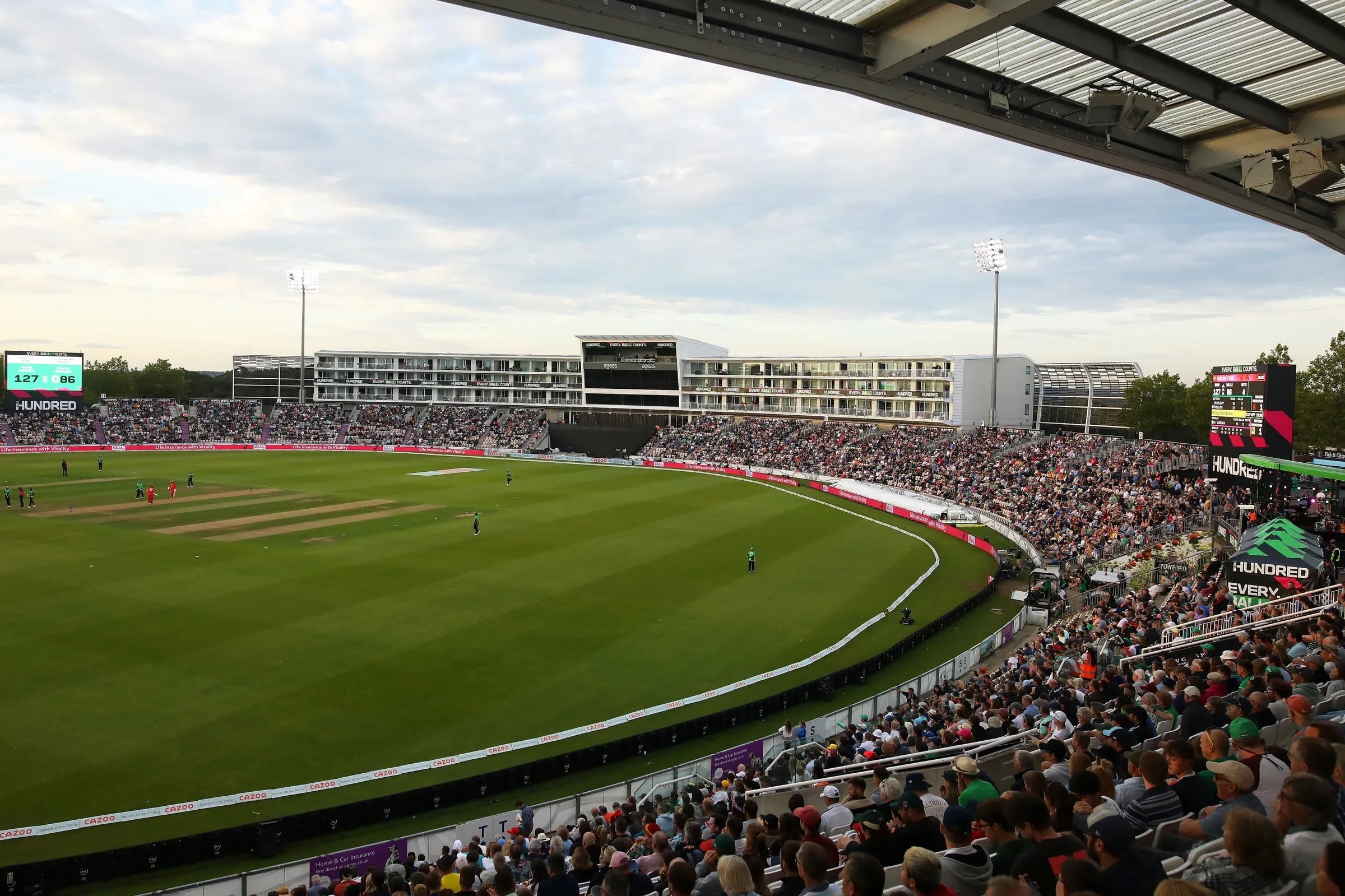Fans watching The Hundred cricket league matchup from stands