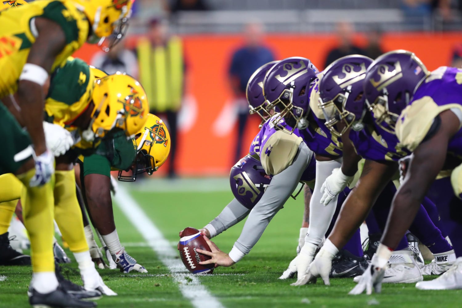 Alliance of American Football (AAF) team at line of scrimmage before start of a play