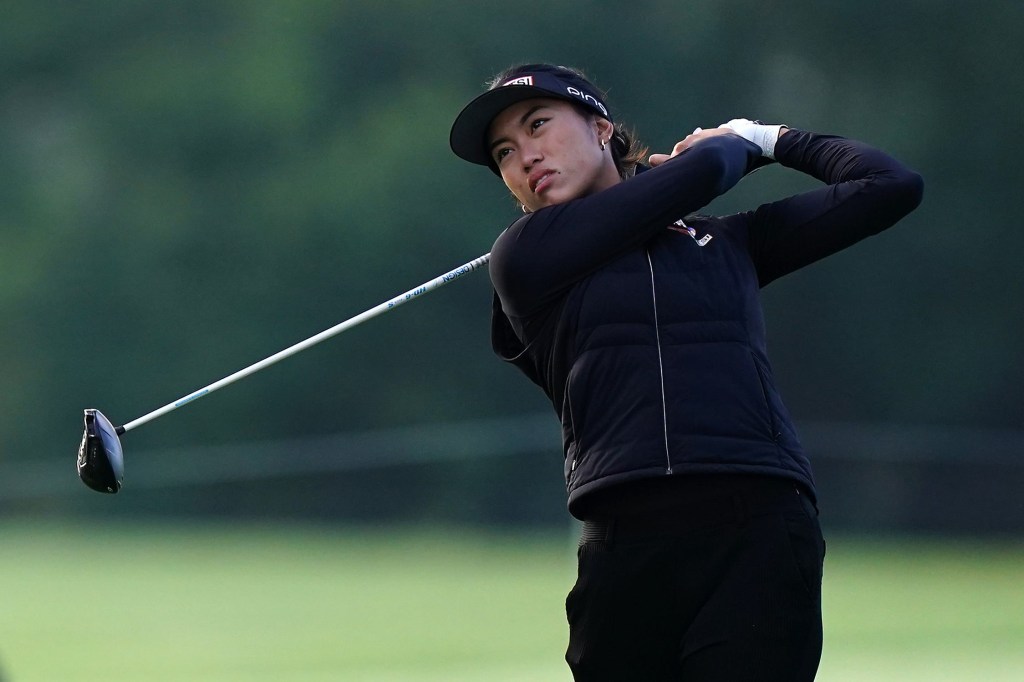 WPGA tour player watches shot