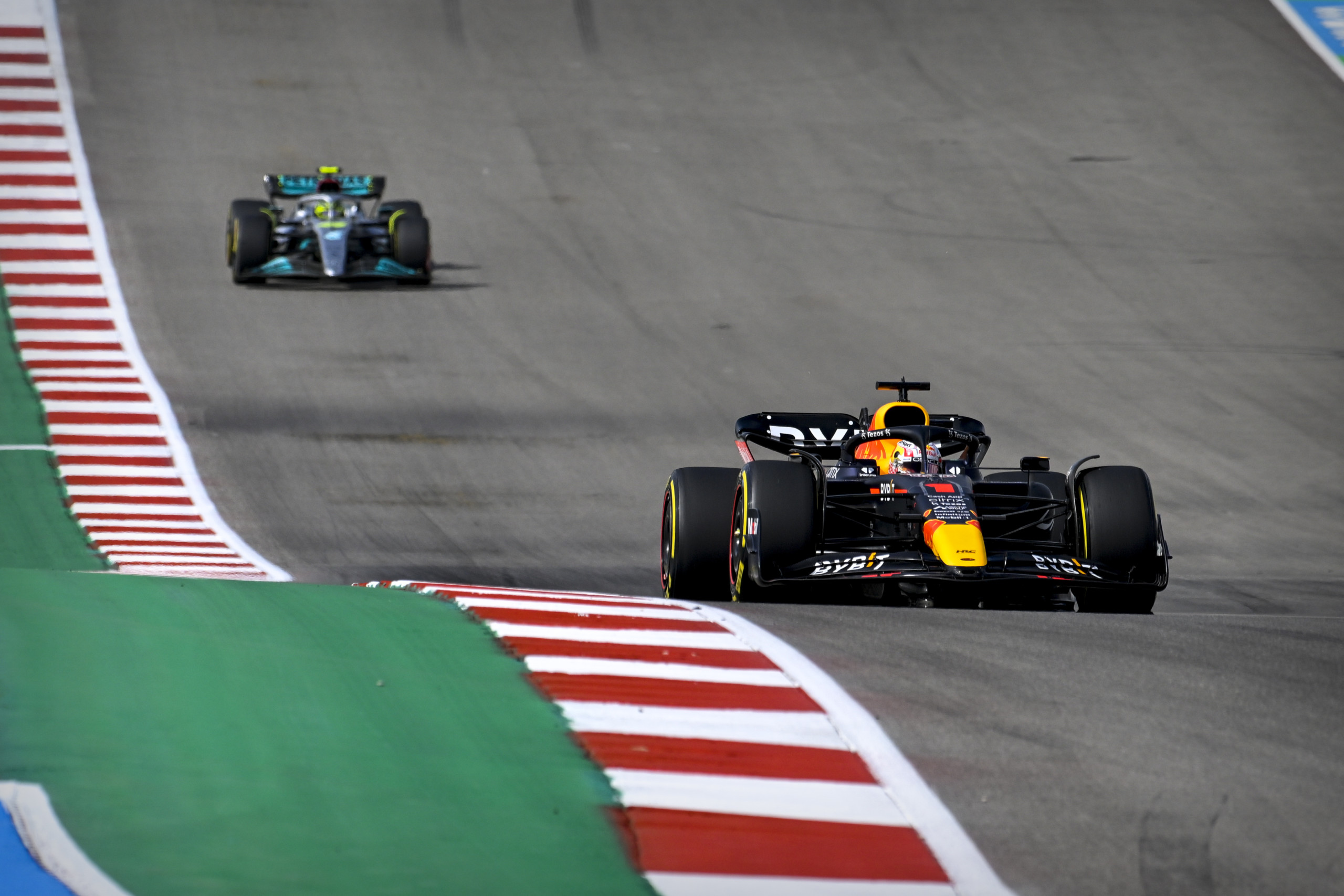Red Bull Racing driver separates from Aston Martin competitor during Formula 1 race