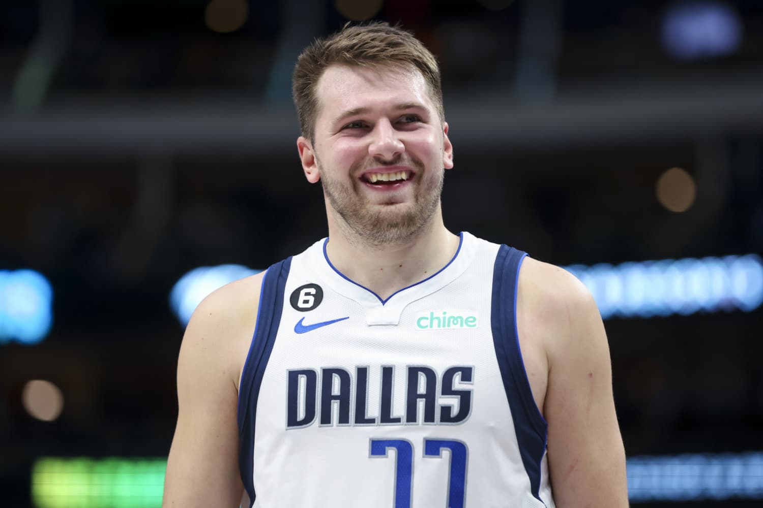 Dallas Mavericks star guard Luka Doncic smiles during NBA game