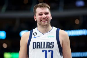Dallas Mavericks star guard Luka Doncic smiles during NBA game
