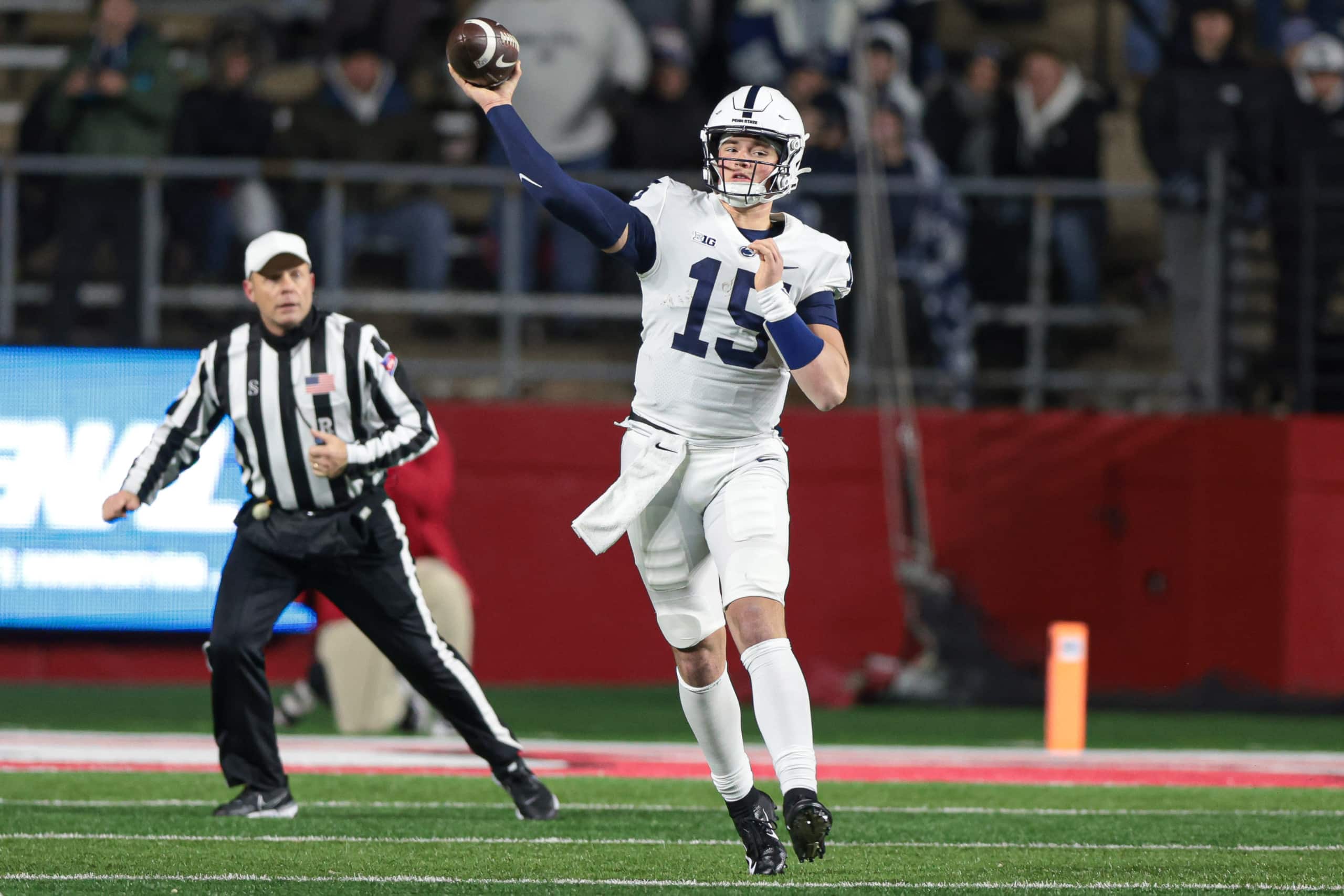 Penn State Freshman quarterback Drew Allar completes pass during college football game