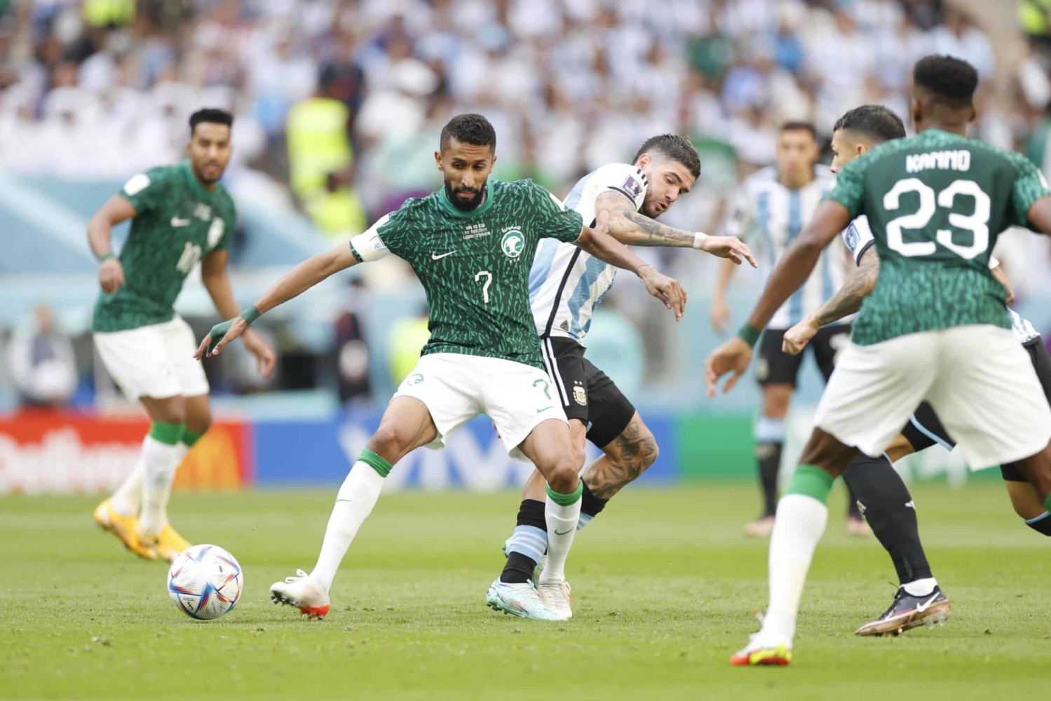 Saudi player wins ball from Argentinian player in World Cup match-up