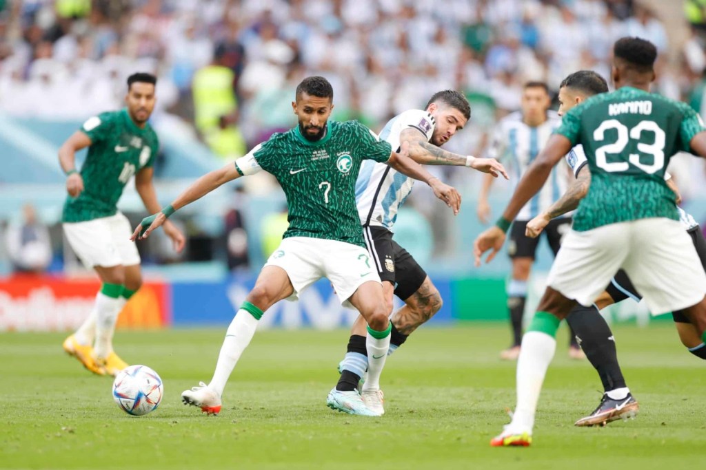 Saudi player wins ball from Argentinian player in World Cup match-up