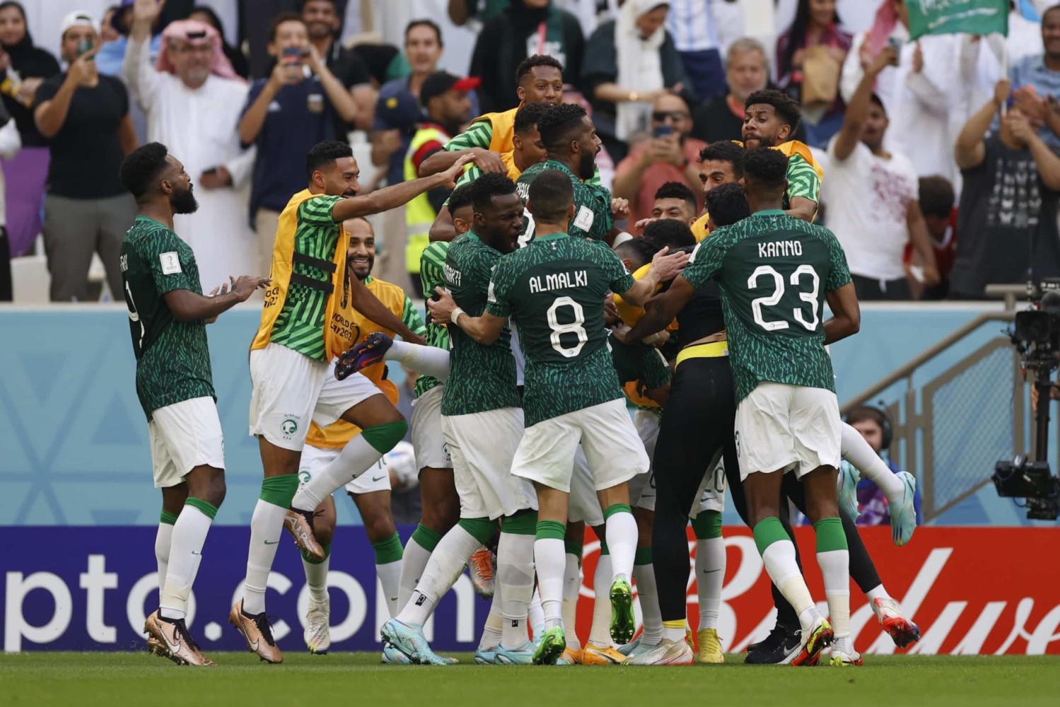 Saudi Arabia team celebrates after beating Argentina in World Cup match