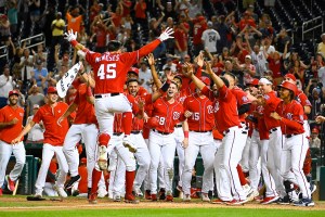 Washington Nationals team celebrates after home run by first baseman Joey Meneses 