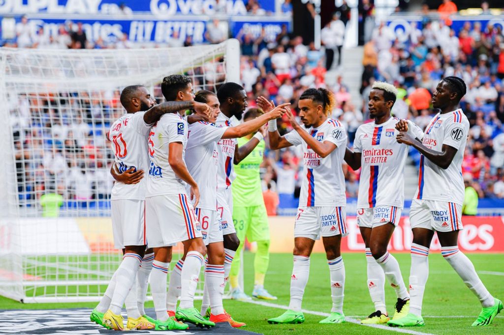 French team Olympique Lyonnais celebrate after scoring goal