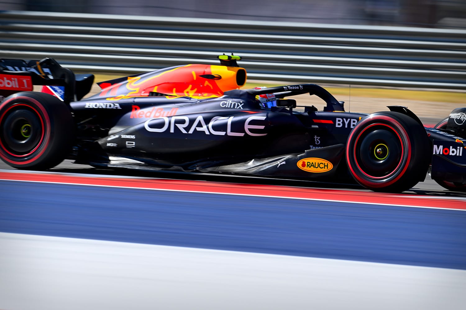 Red Bull F1 car with Oracle branding races around track