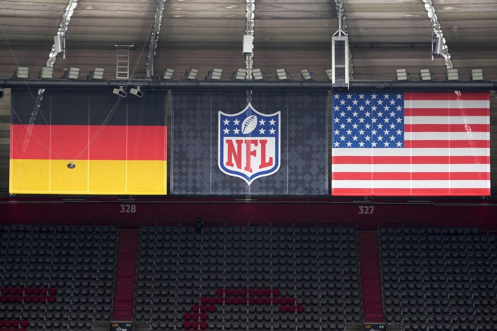 NFL logo in between German and American flags during the first NFL game in Germany