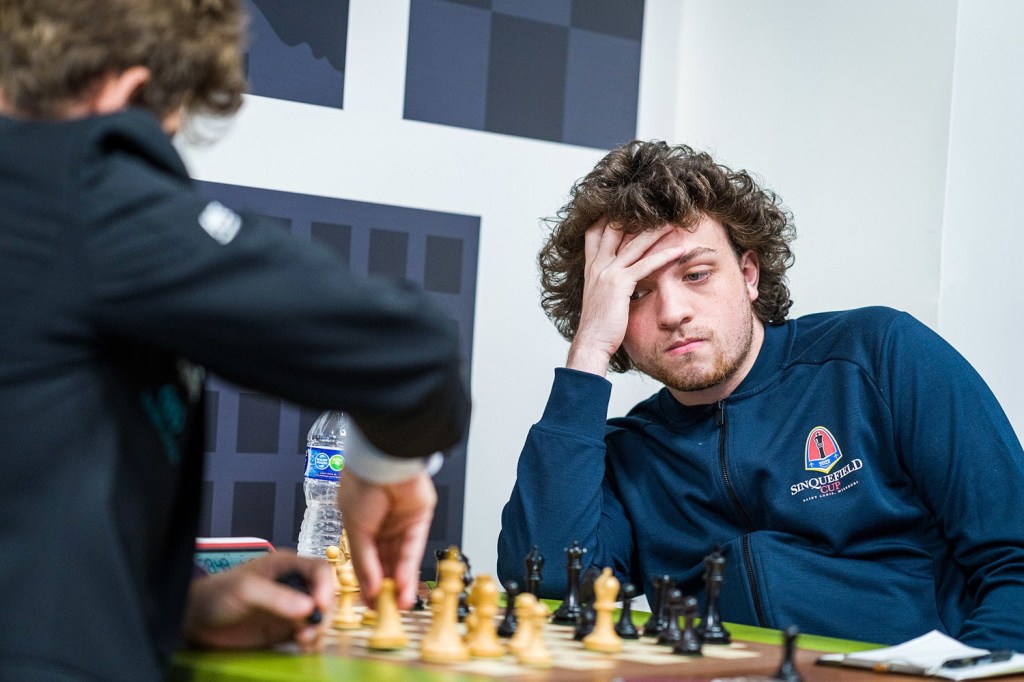 American chess grandmaster Hans Niemann watches opponents move during chess match