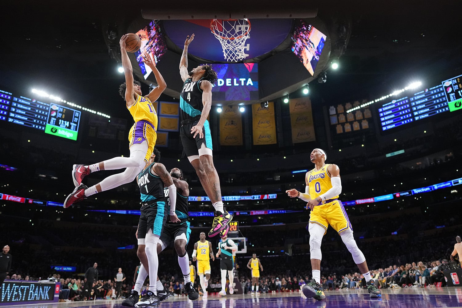 Portland Trailblazers forward contests Los Angeles Lakers shot