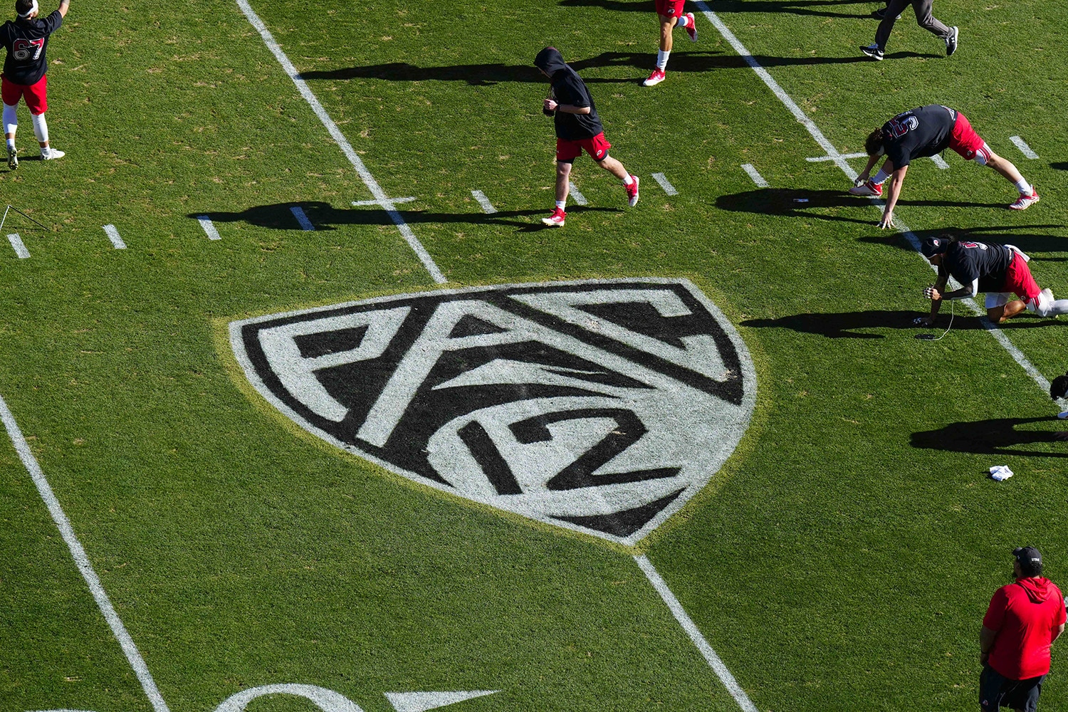 PAC 12 logo on football field