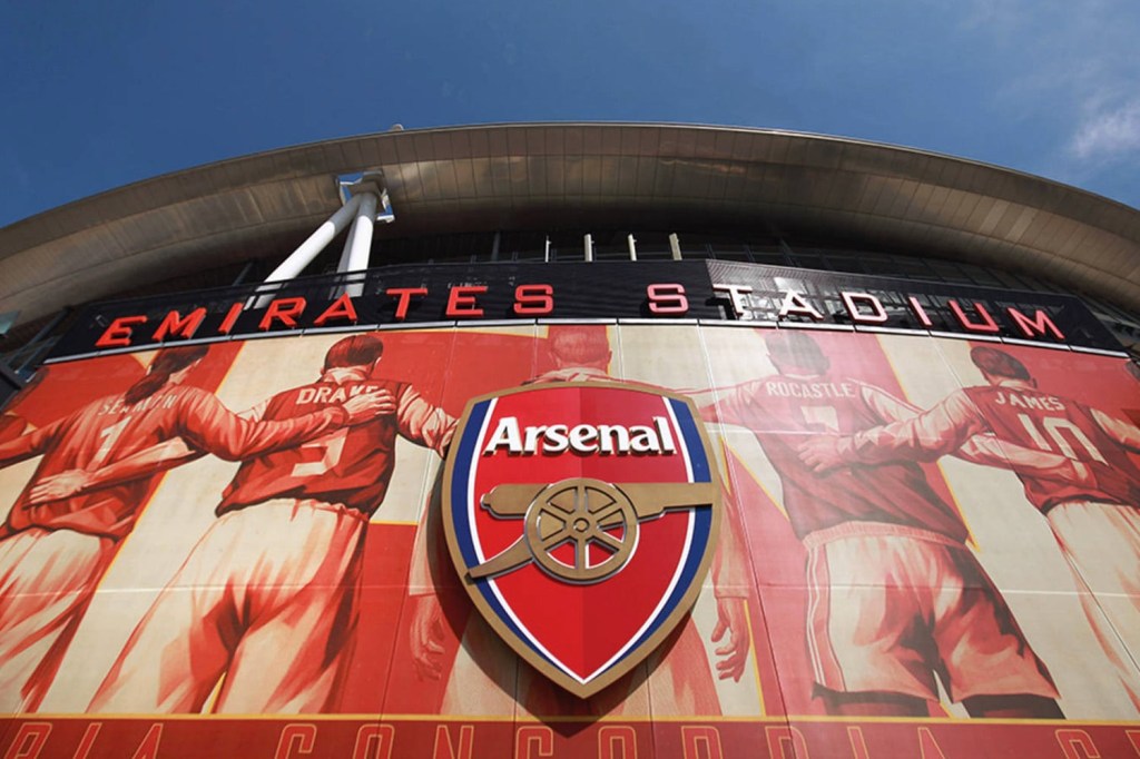 Arsenal FC logo on outside of Emirates Stadium in London