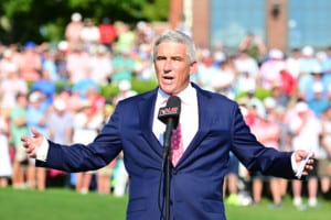 PGA Tour Commissioner Jay Monahan speaks in front of crowd