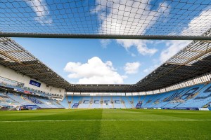 View of field and stands from inside the Coventry City goal
